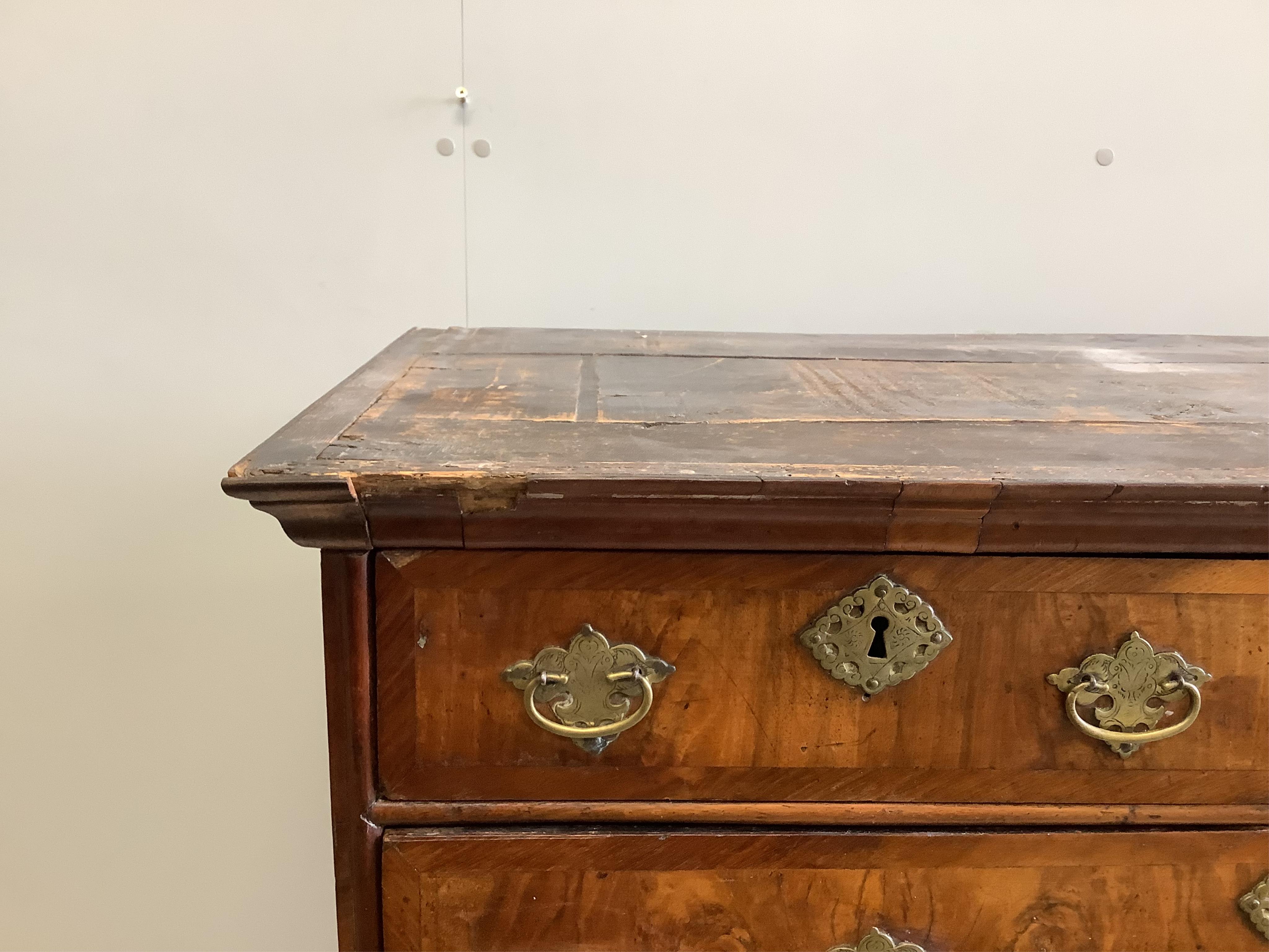 An 18th century and later walnut chest on stand, width 96cm, depth 55cm, height 161cm. Condition - fair